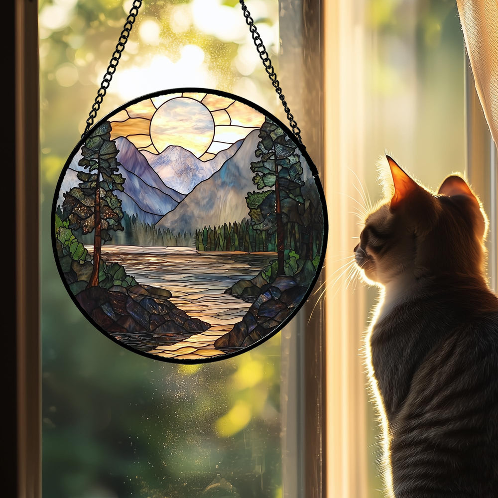 Close-up view of AMDERVEN stained glass suncatcher with intricate patterns