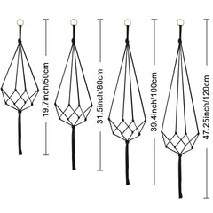 Close-up view of black macramé plant hanger with tassels