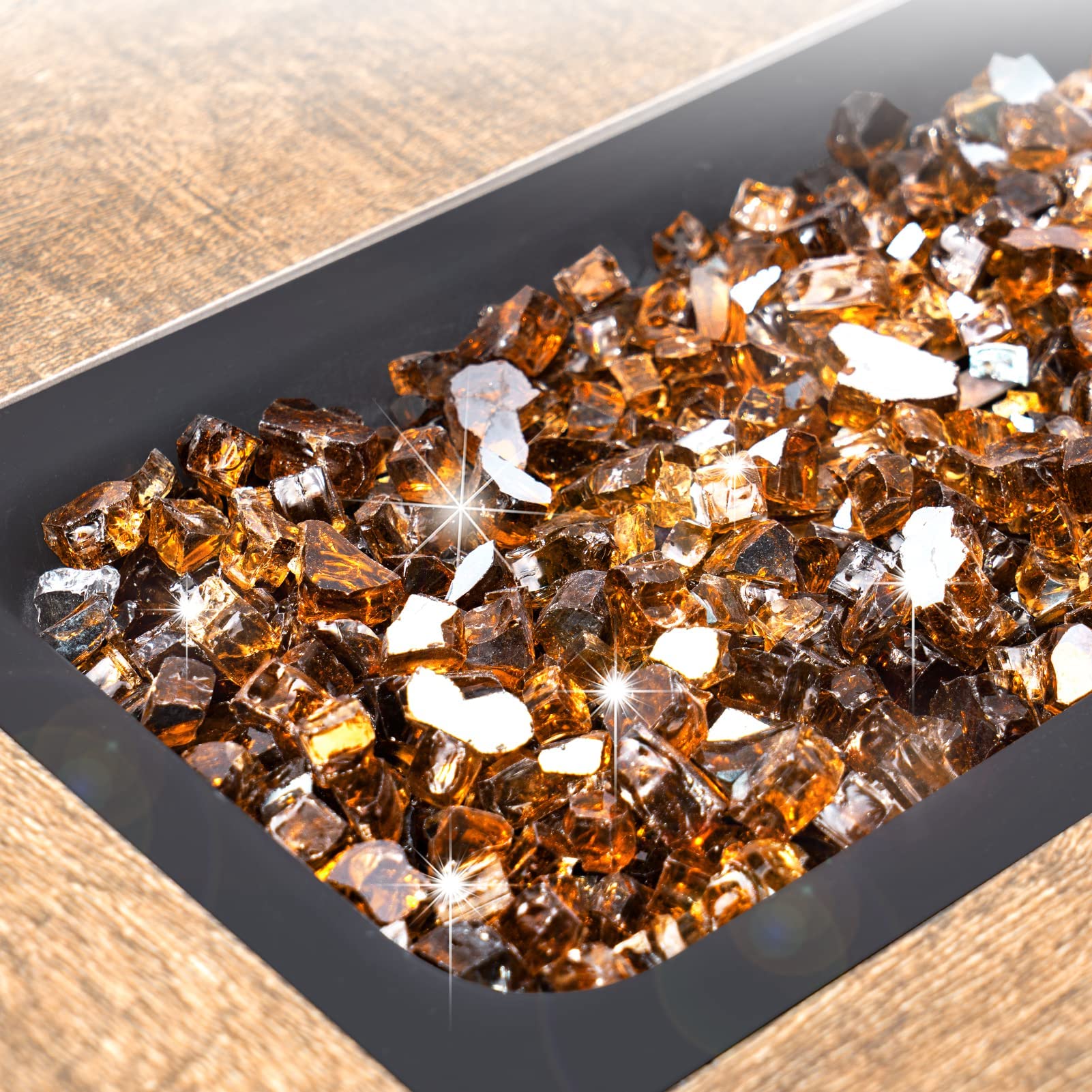 Close-up view of GASPRO reflective fire glass with mirrored surface