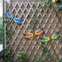 Close-up view of Scwhousi Metal Dragonfly Wall Art showcasing handcrafted design