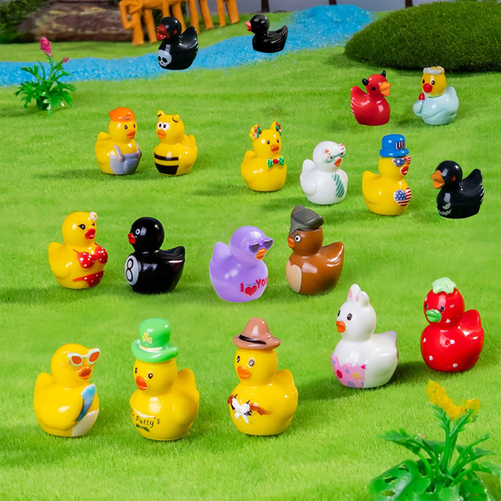 Close-up view of various unique mini ducks including glitter and hat designs