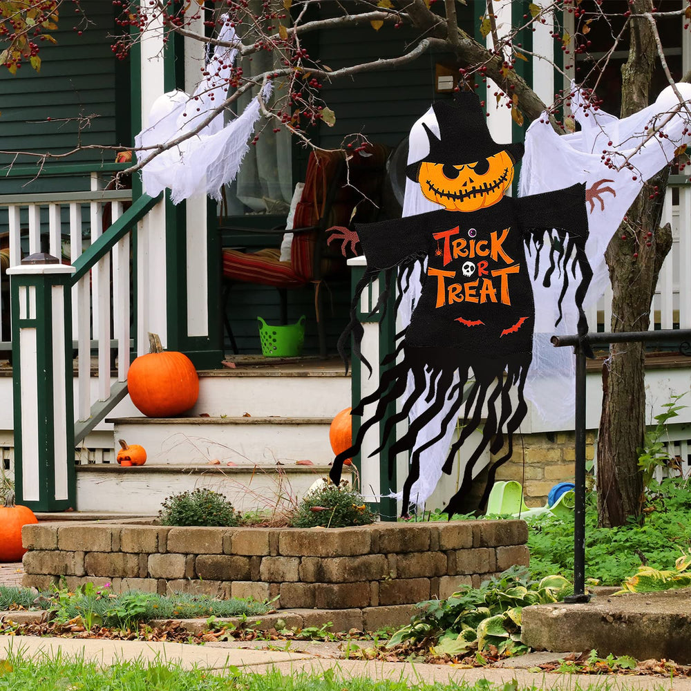 COCHIE Halloween garden flag in a garden setting