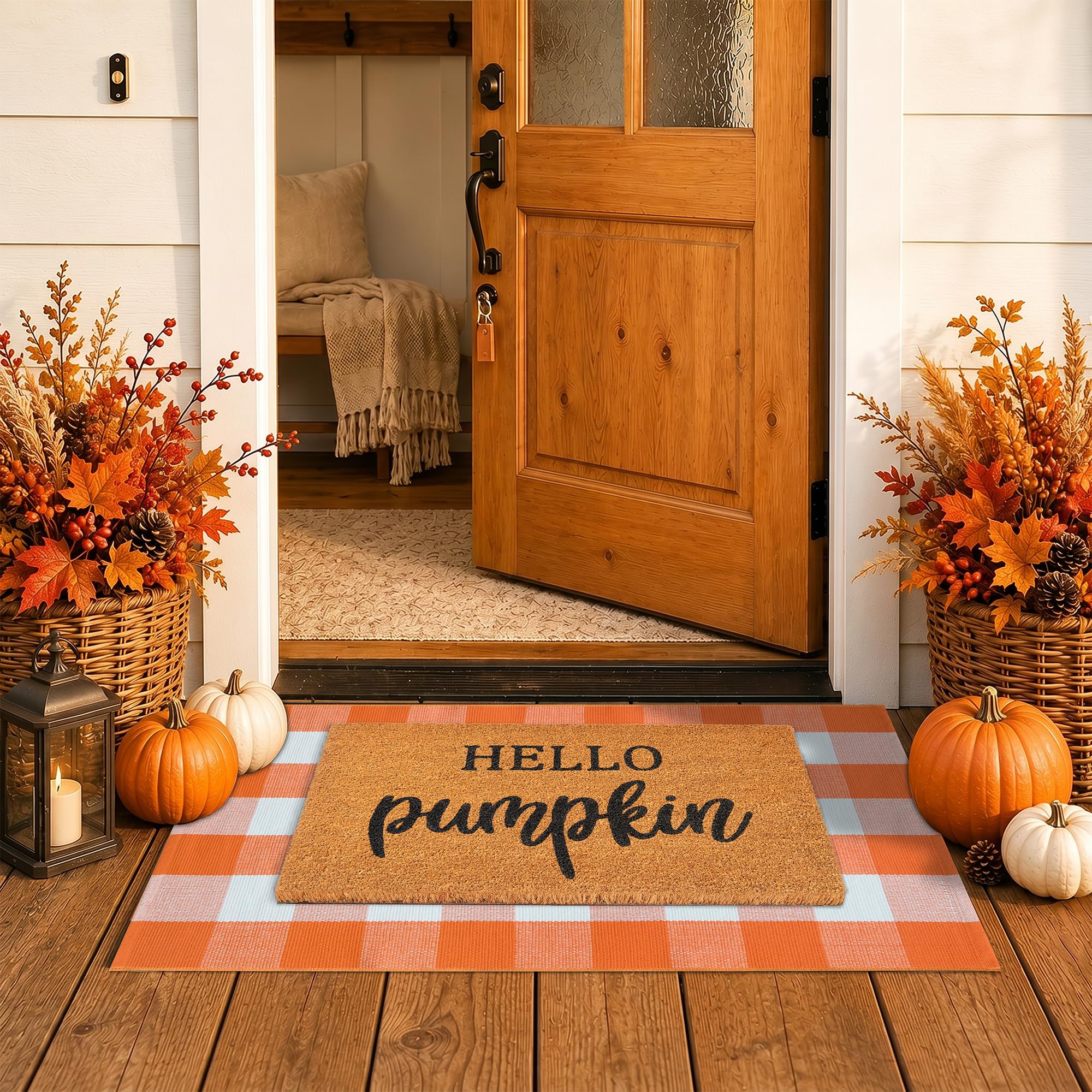 Coco coir welcome mat and plaid rug set on a porch