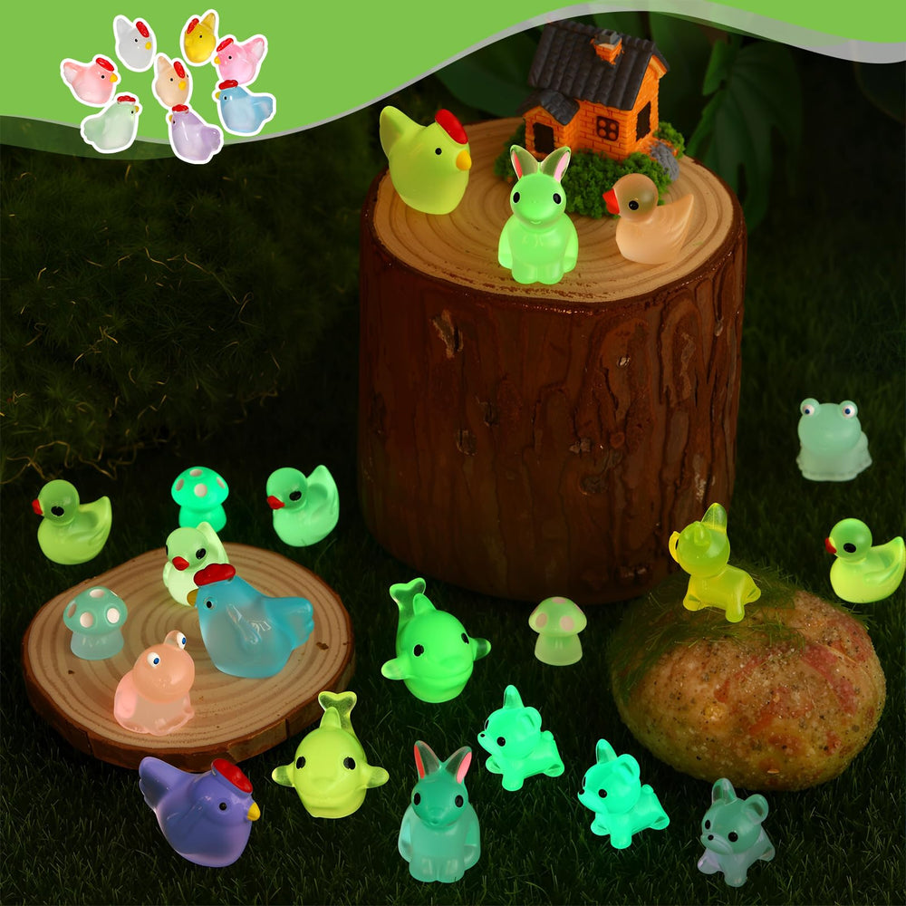 Collection of luminous mini animals in garden setting