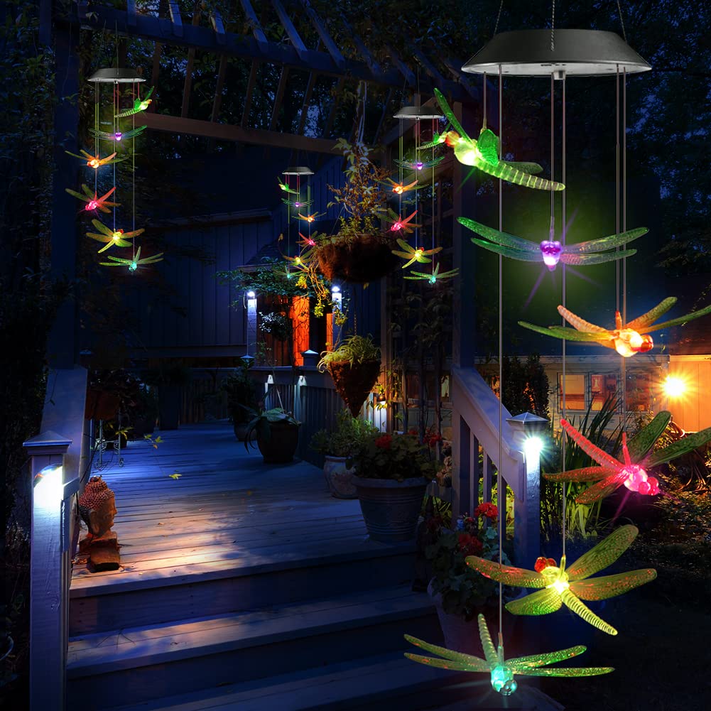 Color changing dragonfly wind chimes glowing at night