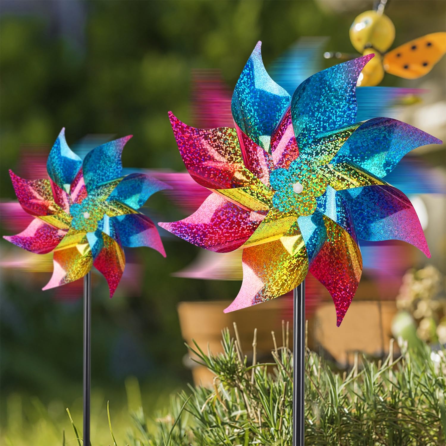 Colorful reflective pinwheels in a vegetable garden