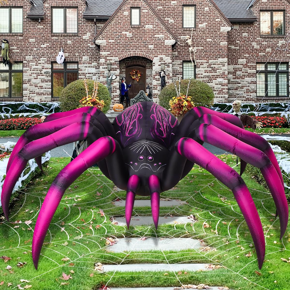 COMIN inflatable spider in a garden setting