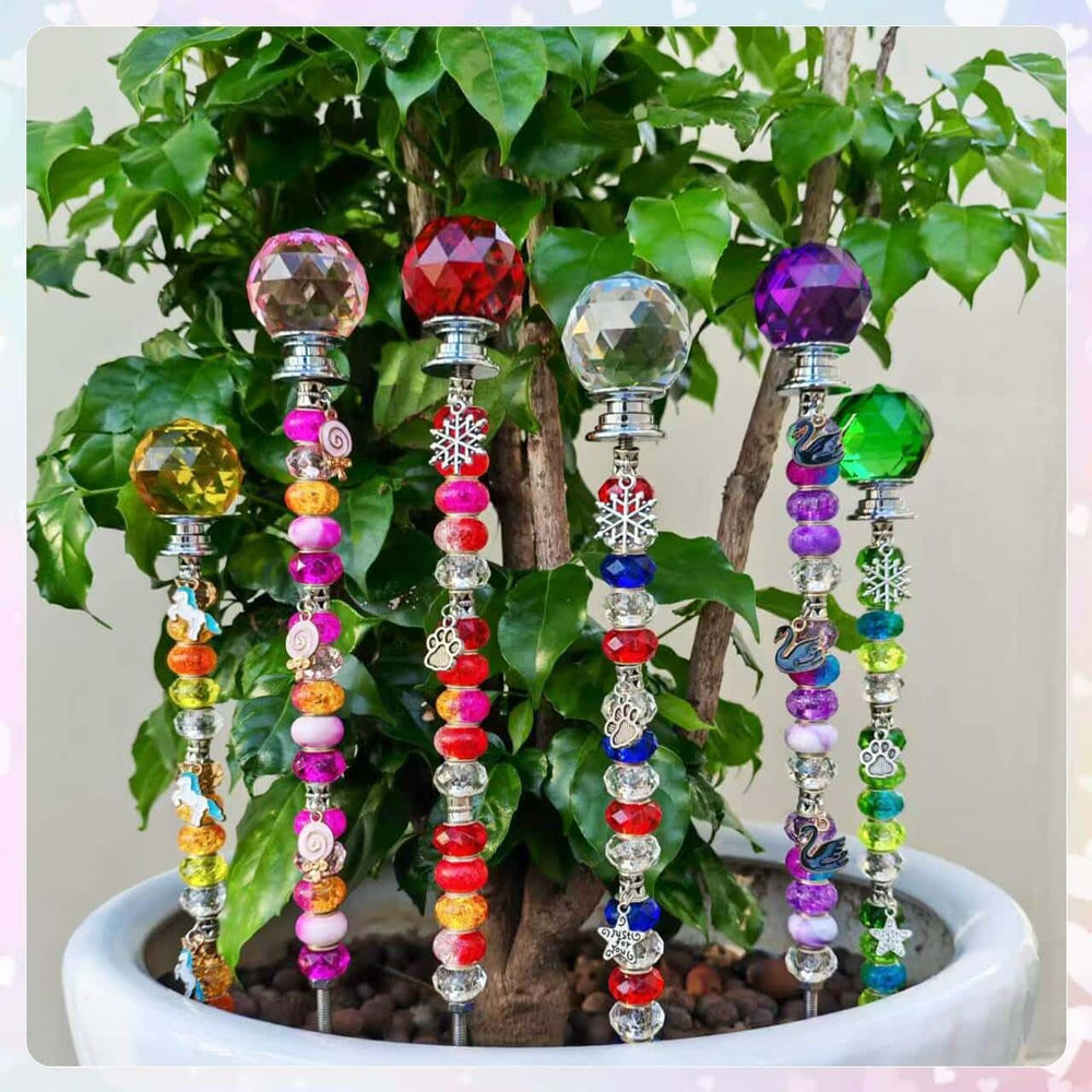 Completed fairy wand showcasing vibrant beads and pendants