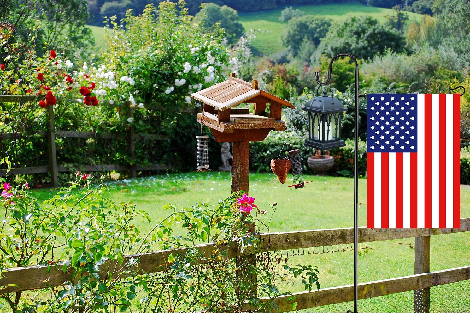 Components of Akeydeco Garden Flag Stand including poles and clips