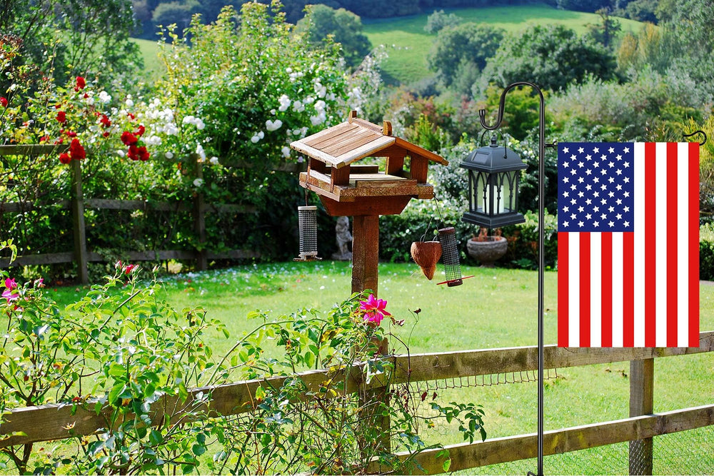 Components of Akeydeco Garden Flag Stand including poles and clips