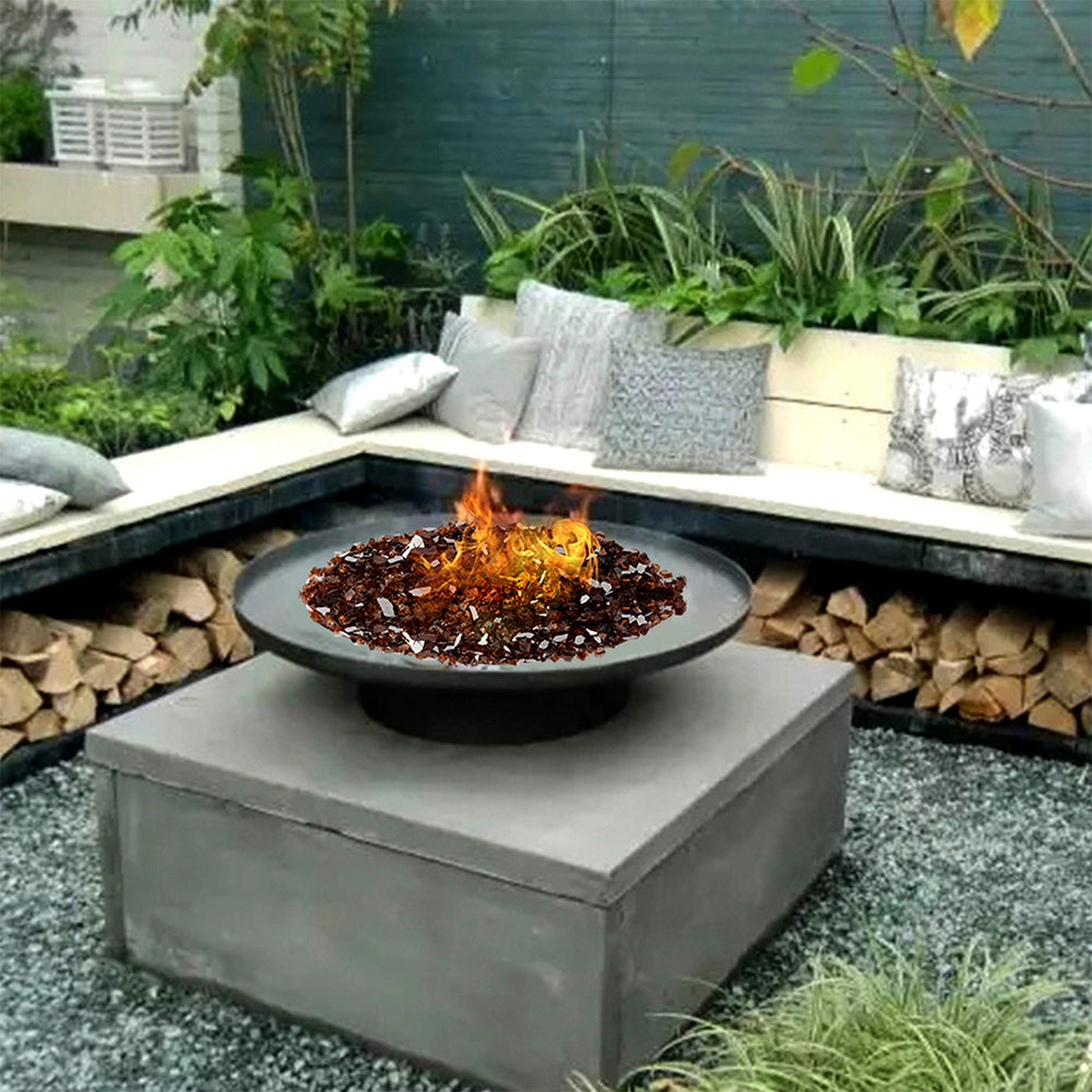 Copper fire glass shimmering in an evening fire