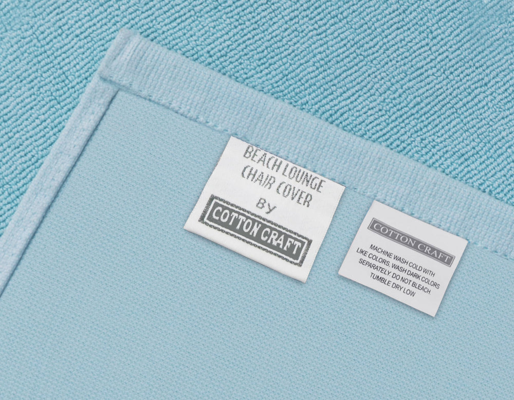 COTTON CRAFT Pool Lounge Chair Cover Blue with a swimming pool in the background