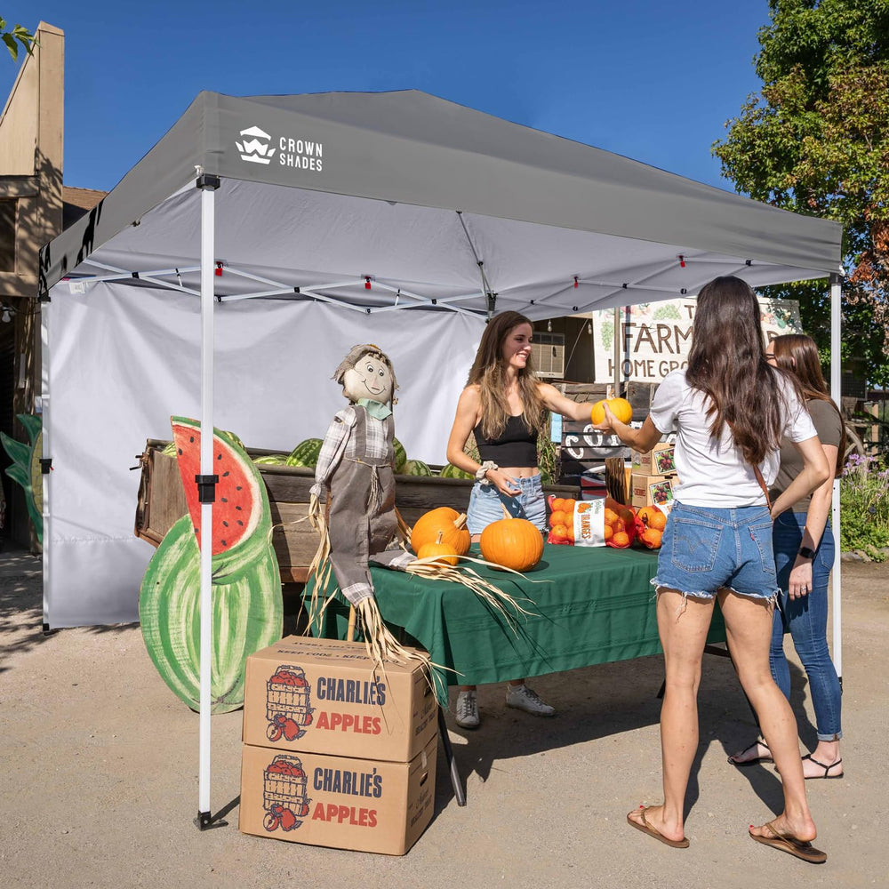 CROWN SHADES sidewall with canopy tent, outdoor event