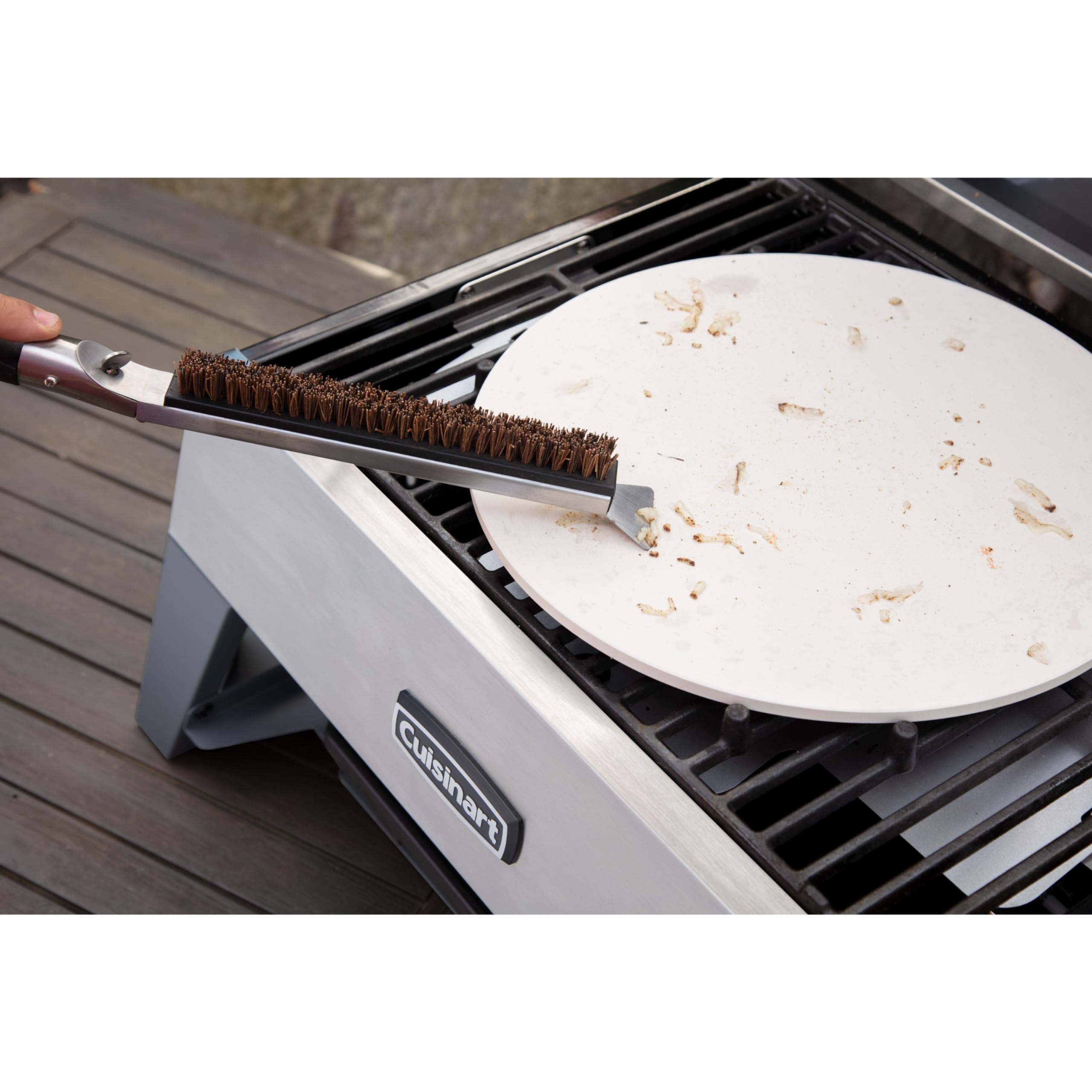 Cuisinart Pizza Stone Cleaning Brush resting on a kitchen counter