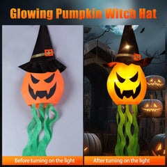 Cuorung lighted pumpkin witch hat glowing in a dark setting