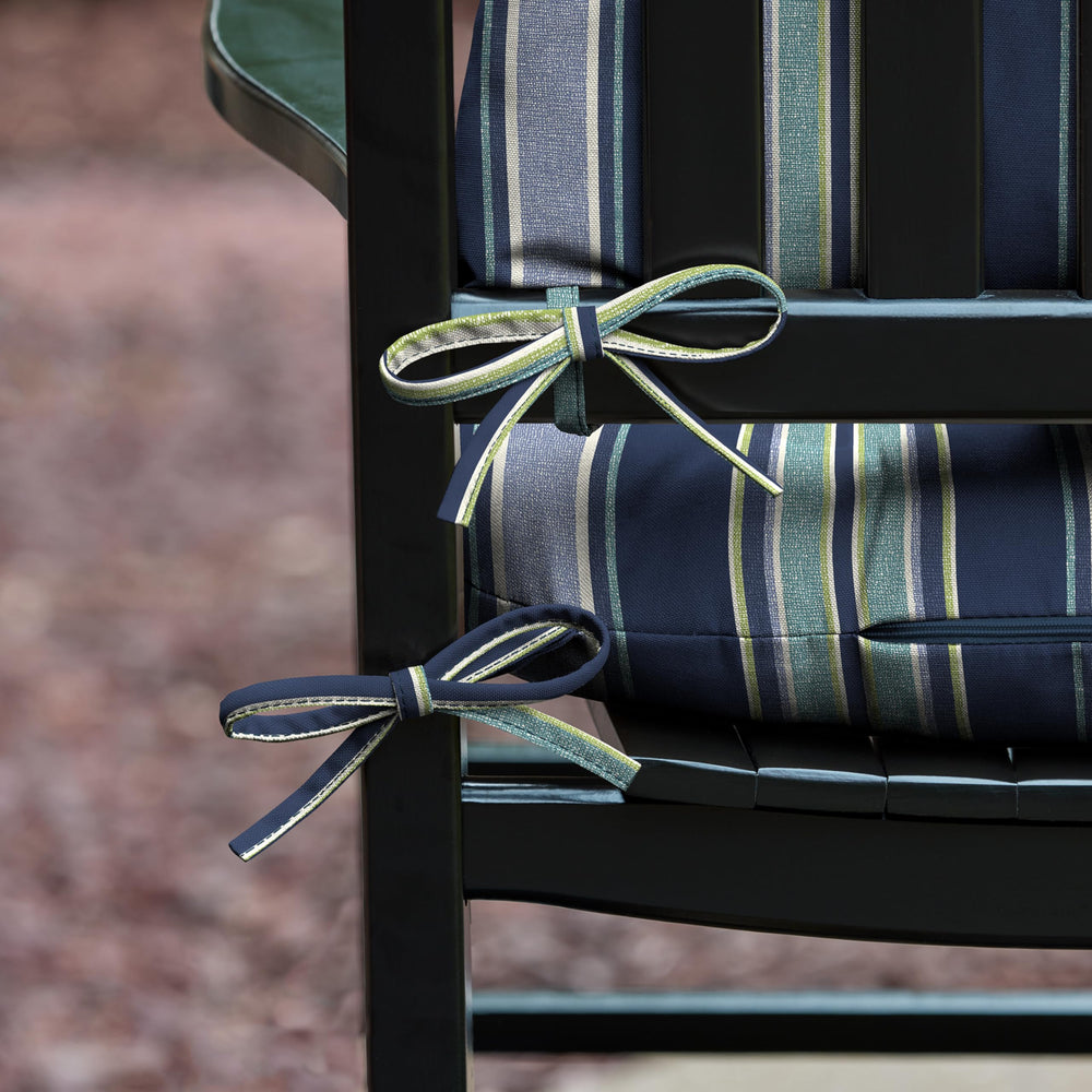 Cushion ties securing the cushion to the rocking chair