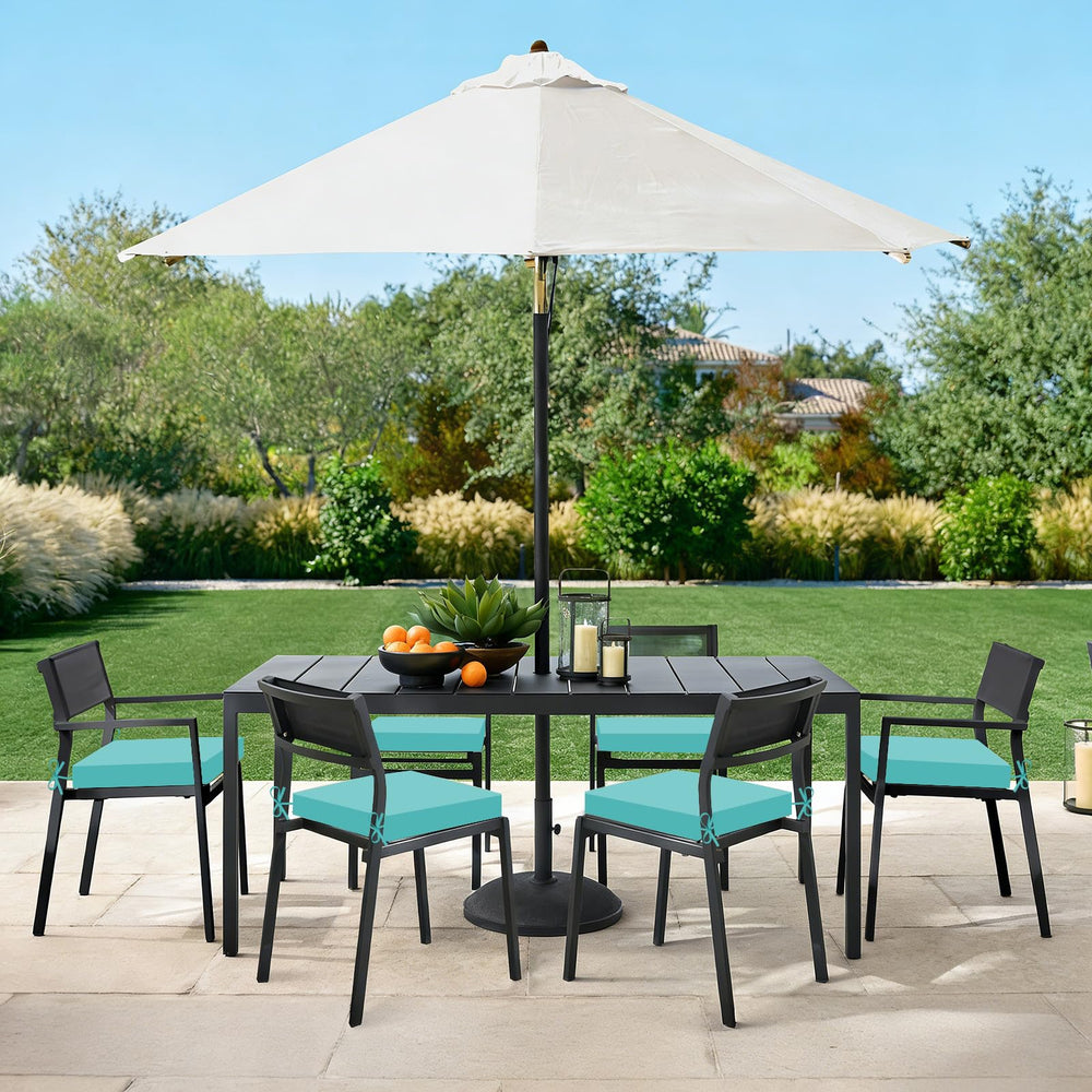Cushions laid out on a sunny patio