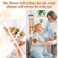 Damaigiift wind chime hanging in garden setting