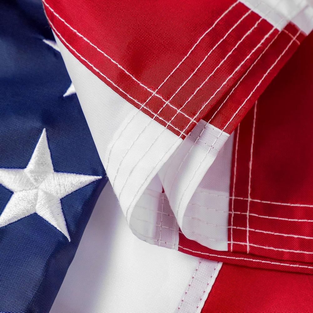 DANF FLAG American Flag displayed outdoors in a garden setting