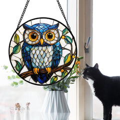 DASTOLL stained glass owl suncatcher hanging in a window