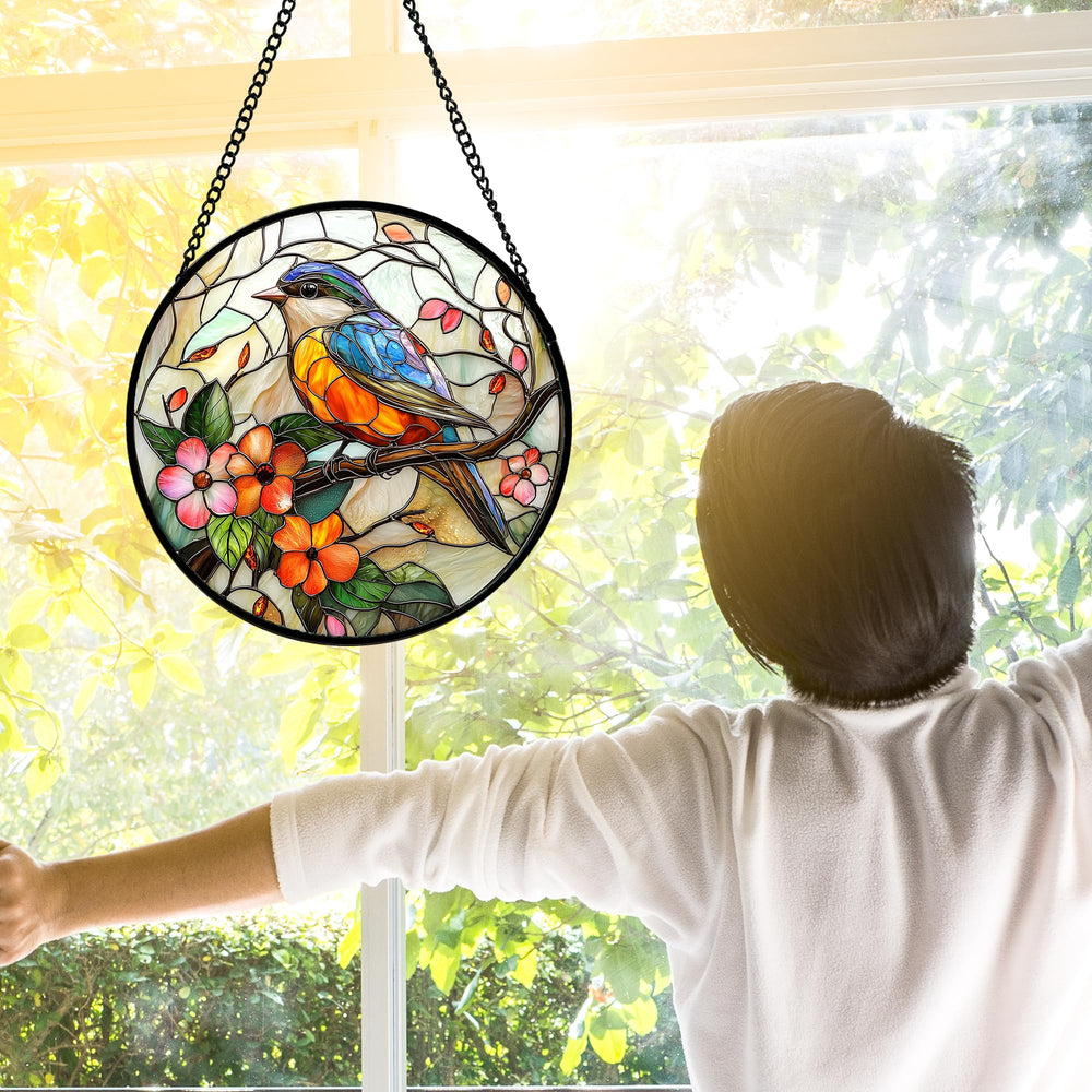 DASTOLL stained glass suncatcher displayed on a window sill