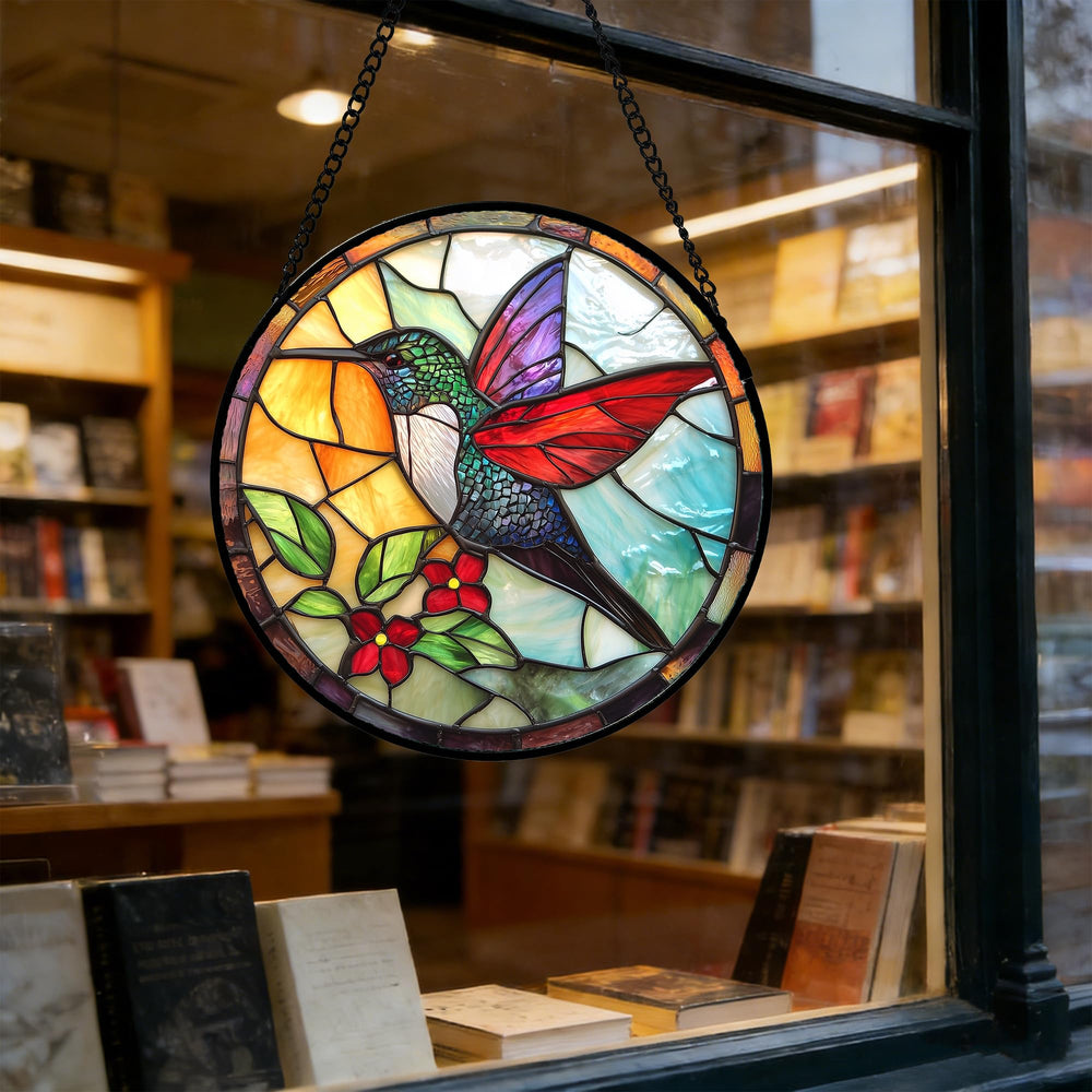 DASTOLL suncatcher displayed in a window