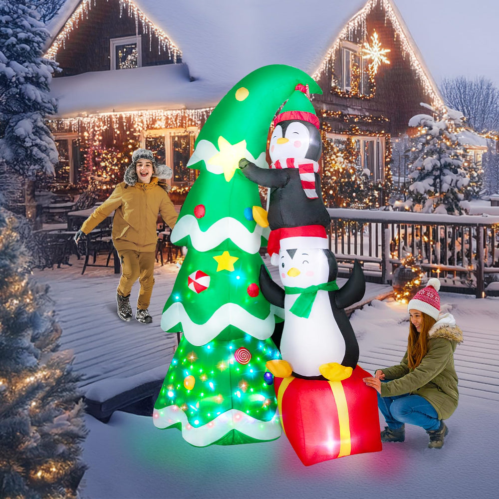 Dawdix inflatable illuminated at night in garden