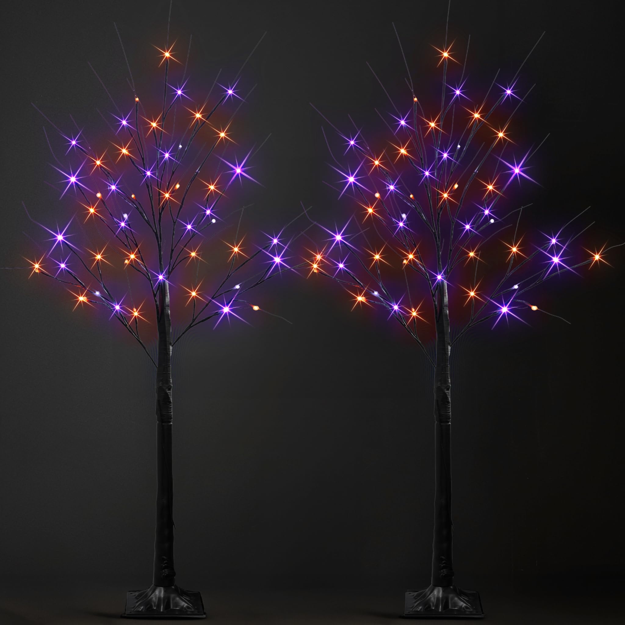 Dazzle Bright Halloween lighted birch trees displayed on a porch