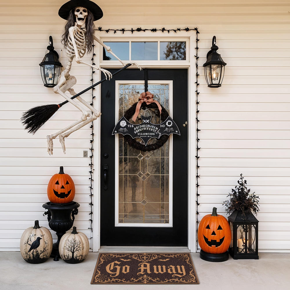 Detail of bats and spider web patterns on the Halloween Door Mat