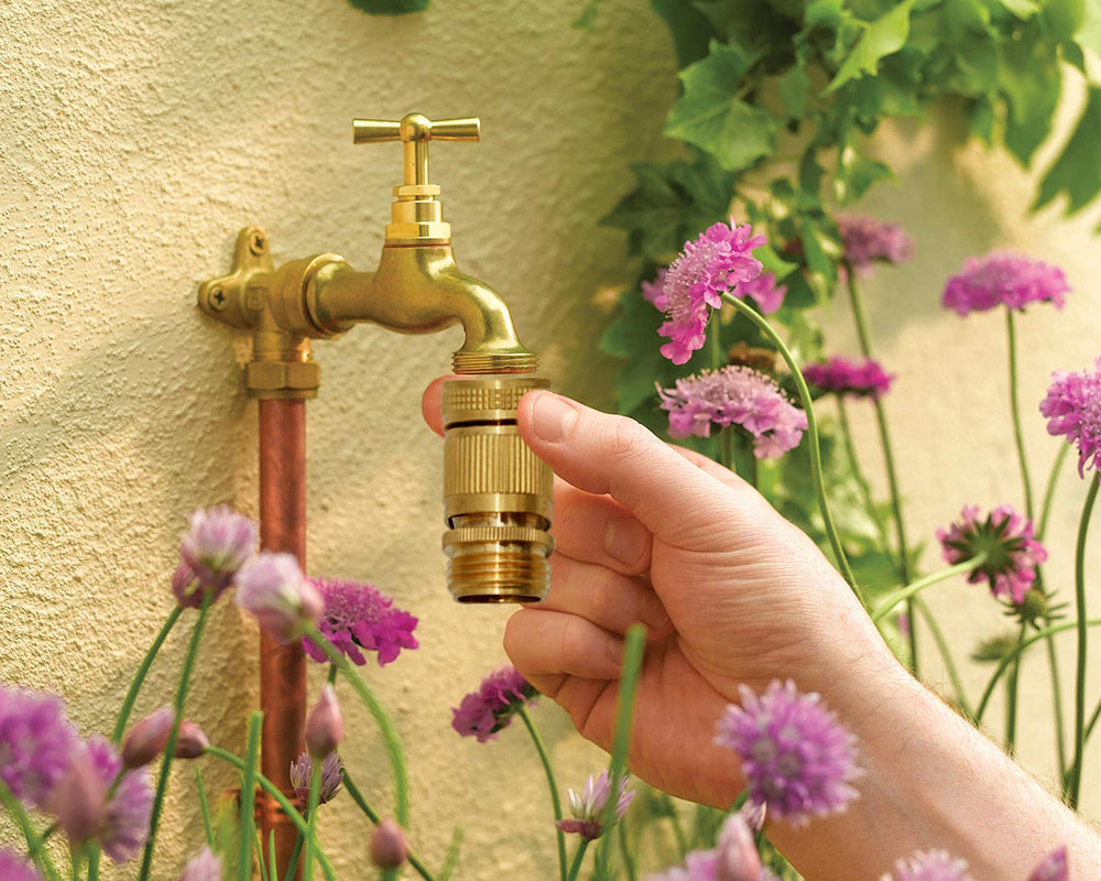 Detailed view of HQMPC brass connectors for garden hoses