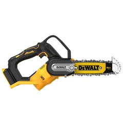 DEWALT Chainsaw DCCS623B in action cutting branches