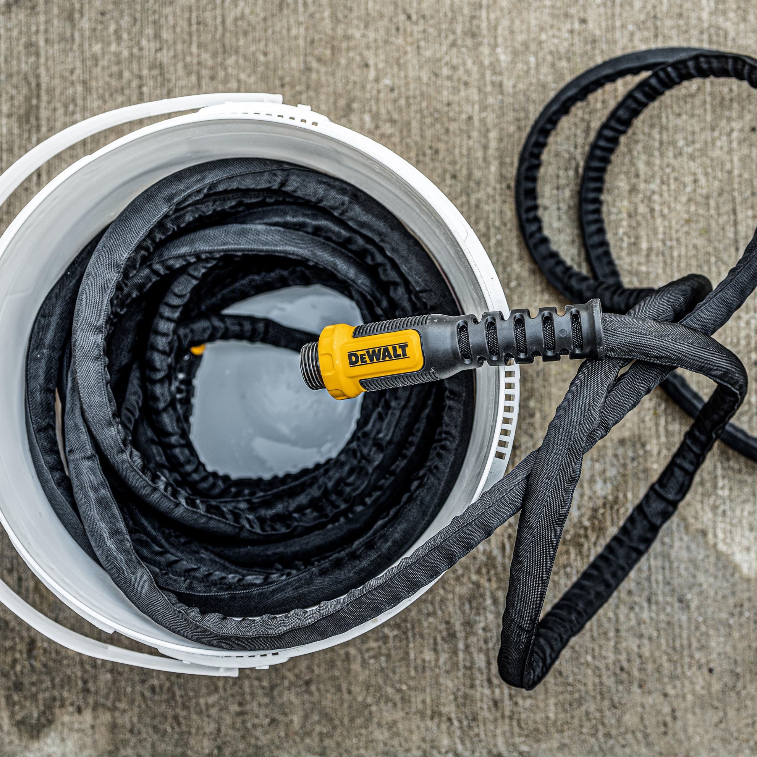 DEWALT garden hose with water flowing