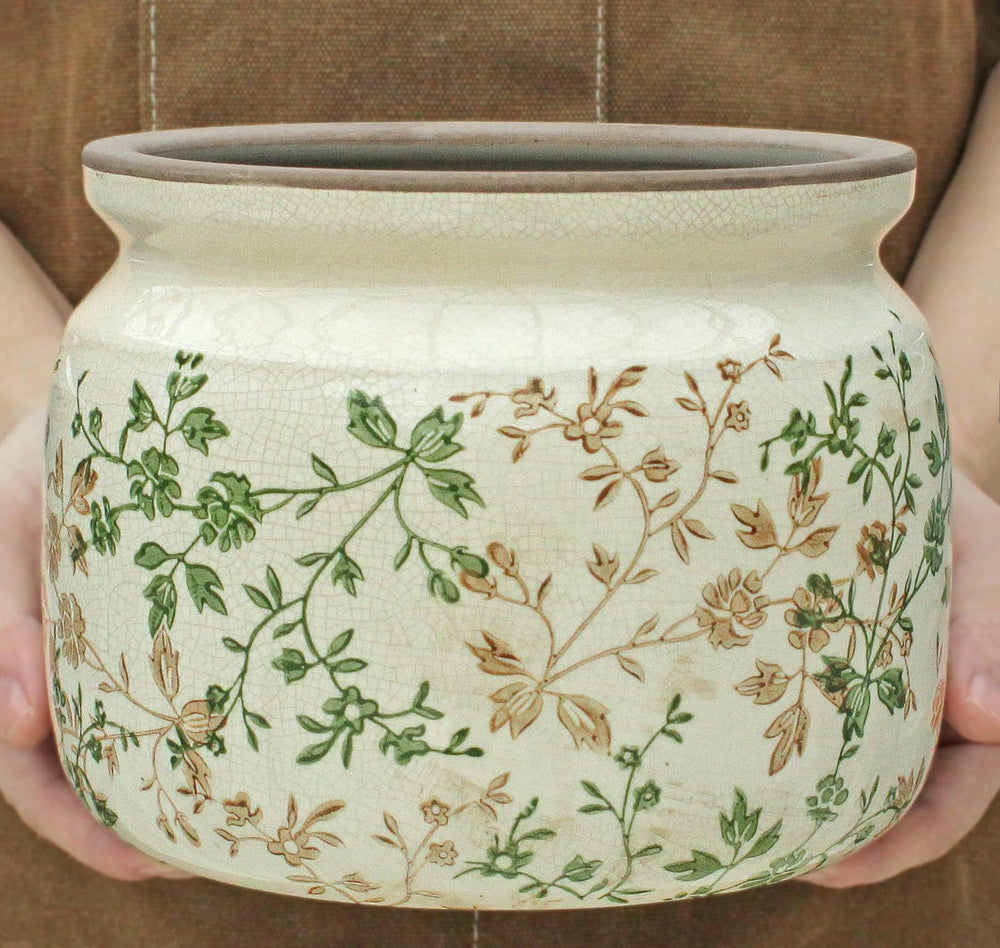 Diatomaceous earth saucer under the ceramic plant pot