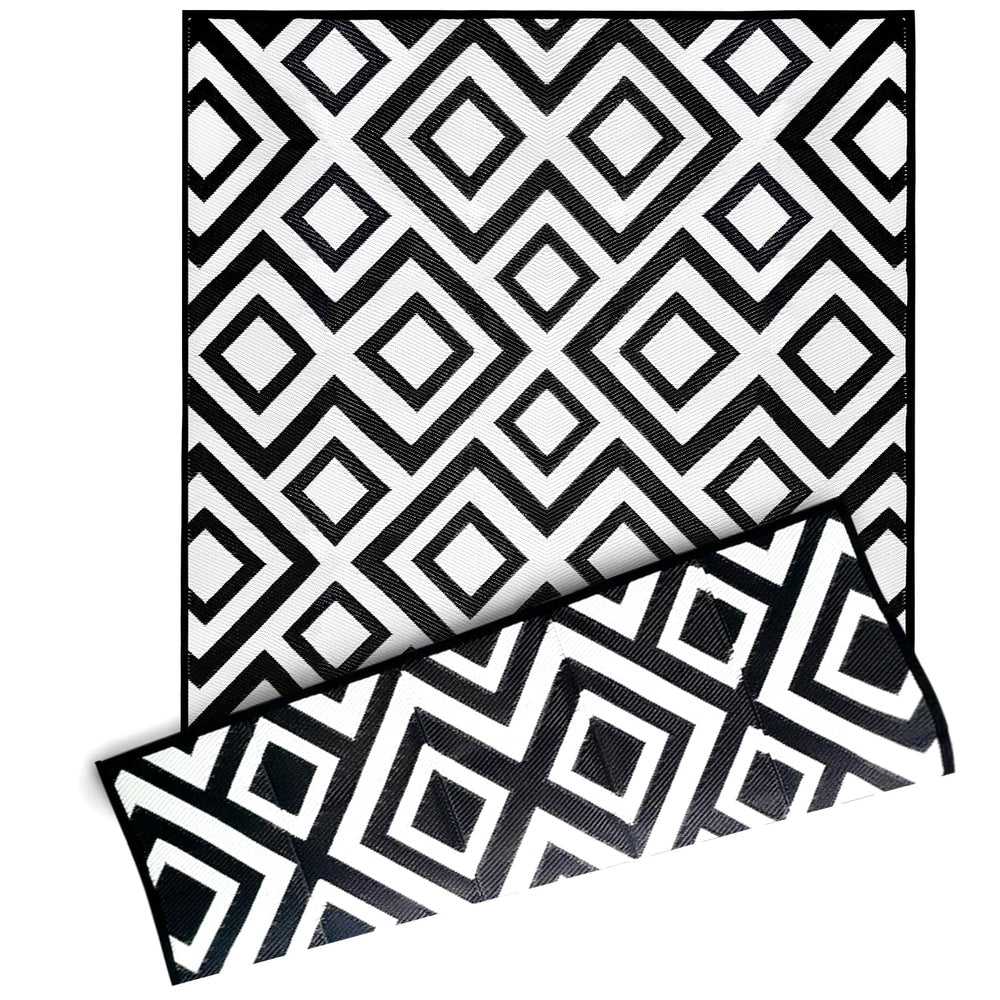 DiiKoo Outdoor Rug on a patio setting