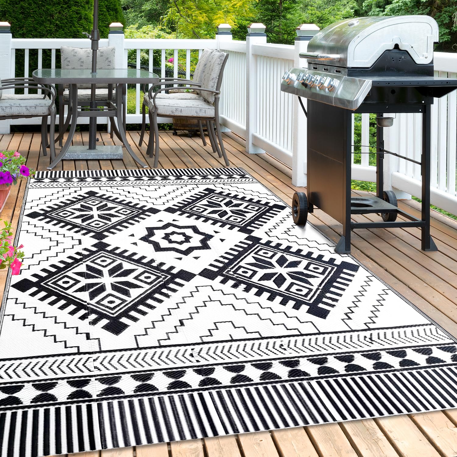 DiiKoo Outdoor Rug set up at a picnic with food and drinks