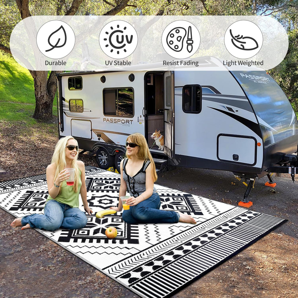 DiiKoo Waterproof Outdoor Rug 8x10ft being used at a picnic setting
