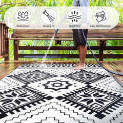 DiiKoo Waterproof Outdoor Rug 8x10ft set up on a patio with outdoor furniture