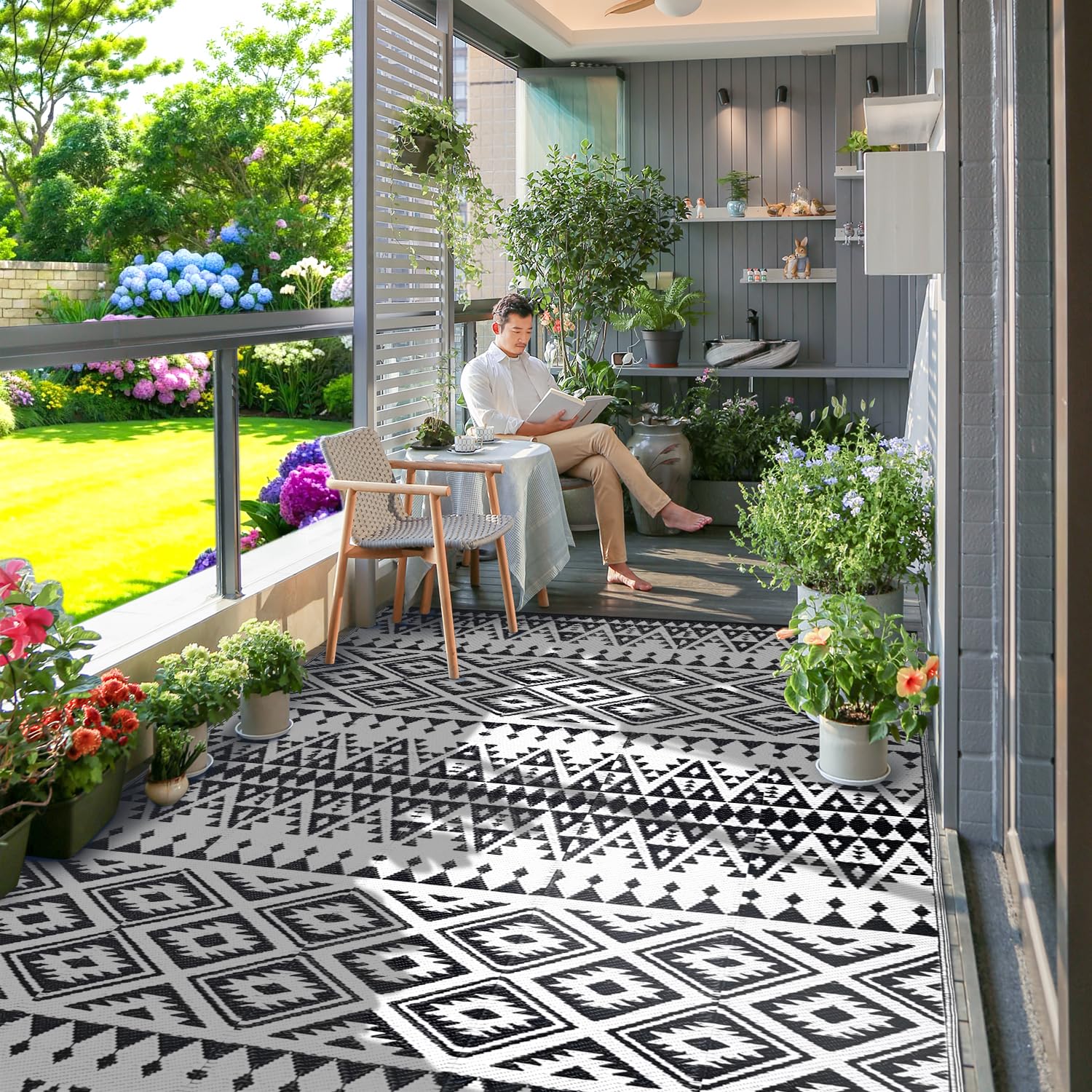 DiiKoo waterproof outdoor rug being cleaned with water