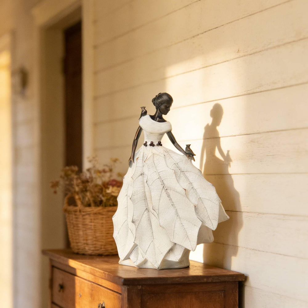 DiliComing Fairy Garden Statue displayed in a garden setting