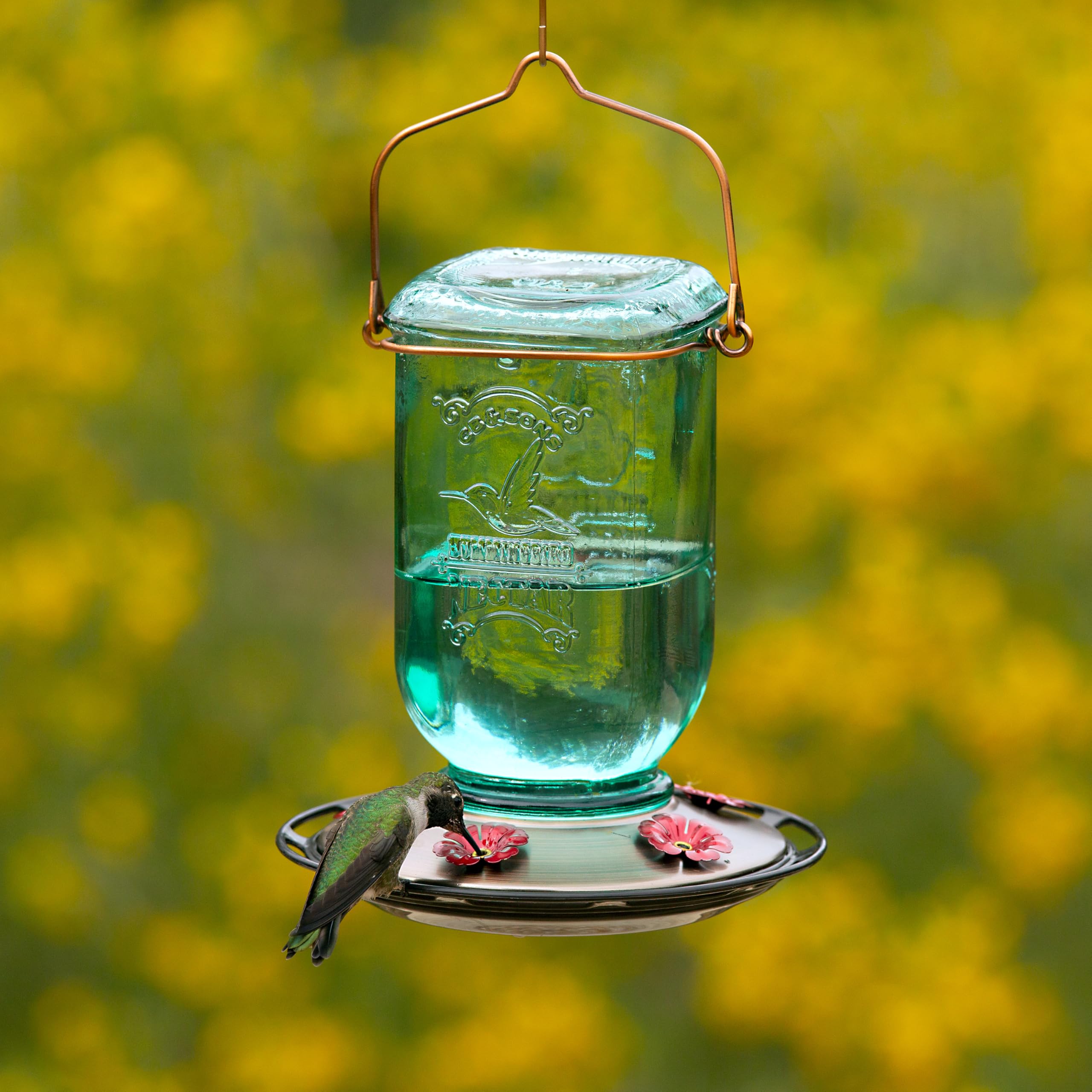 Disassembled parts of the More Birds Mason Jar Hummingbird Feeder for cleaning