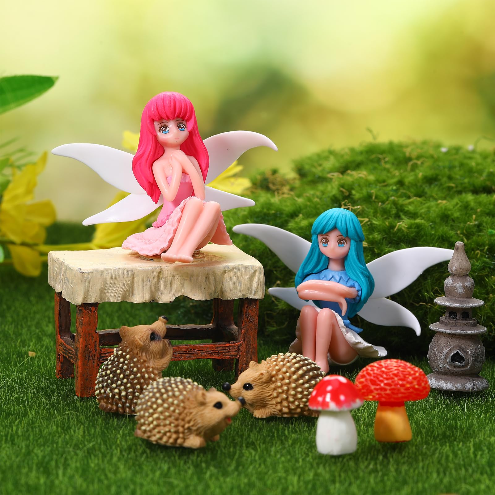 Display of GGSTDDUP fairy garden accessories in a garden