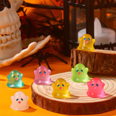 Display of Vellibring Halloween mini ghosts in a garden setting