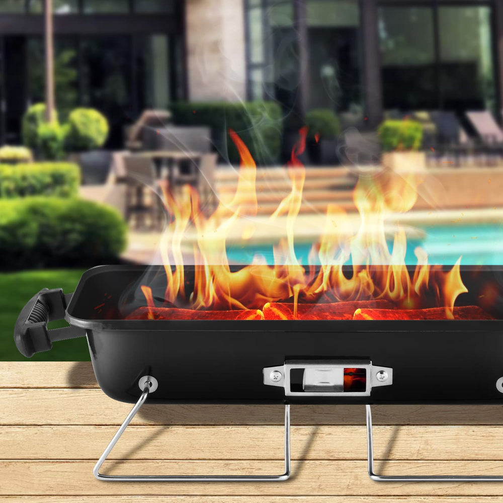 DNKMOR grill showing wood handle and assembly