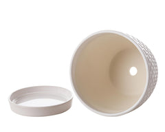 Docrin Ceramic Plant Pot Set displayed on a modern shelf