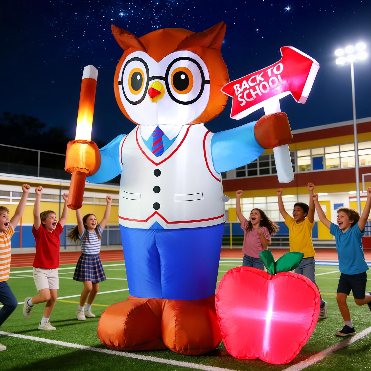 DomKom Inflatable Professor Owl illuminated with LED lights at night