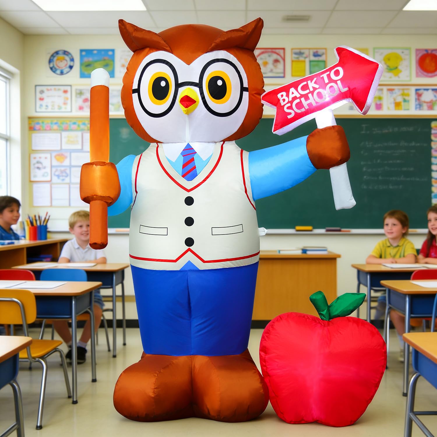 DomKom Inflatable Professor Owl secured in a lawn with stakes