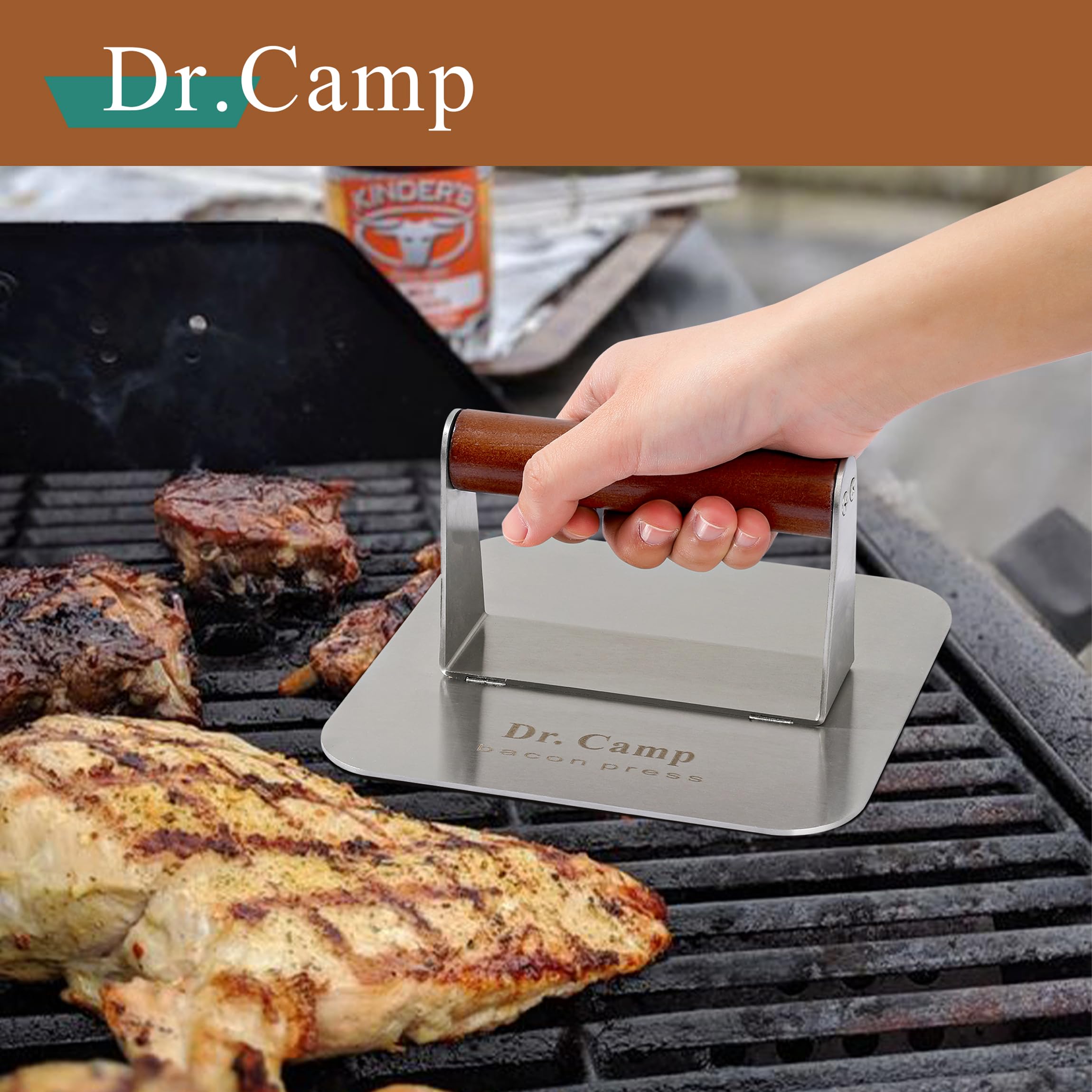 Dr.Camp burger press in use on a grill