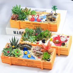 Dracarys fairy garden accessories set displayed in a miniature garden