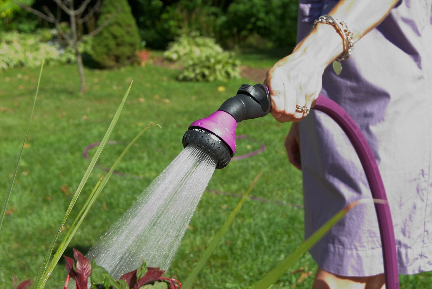 Dramm One Touch Wand in use watering plants