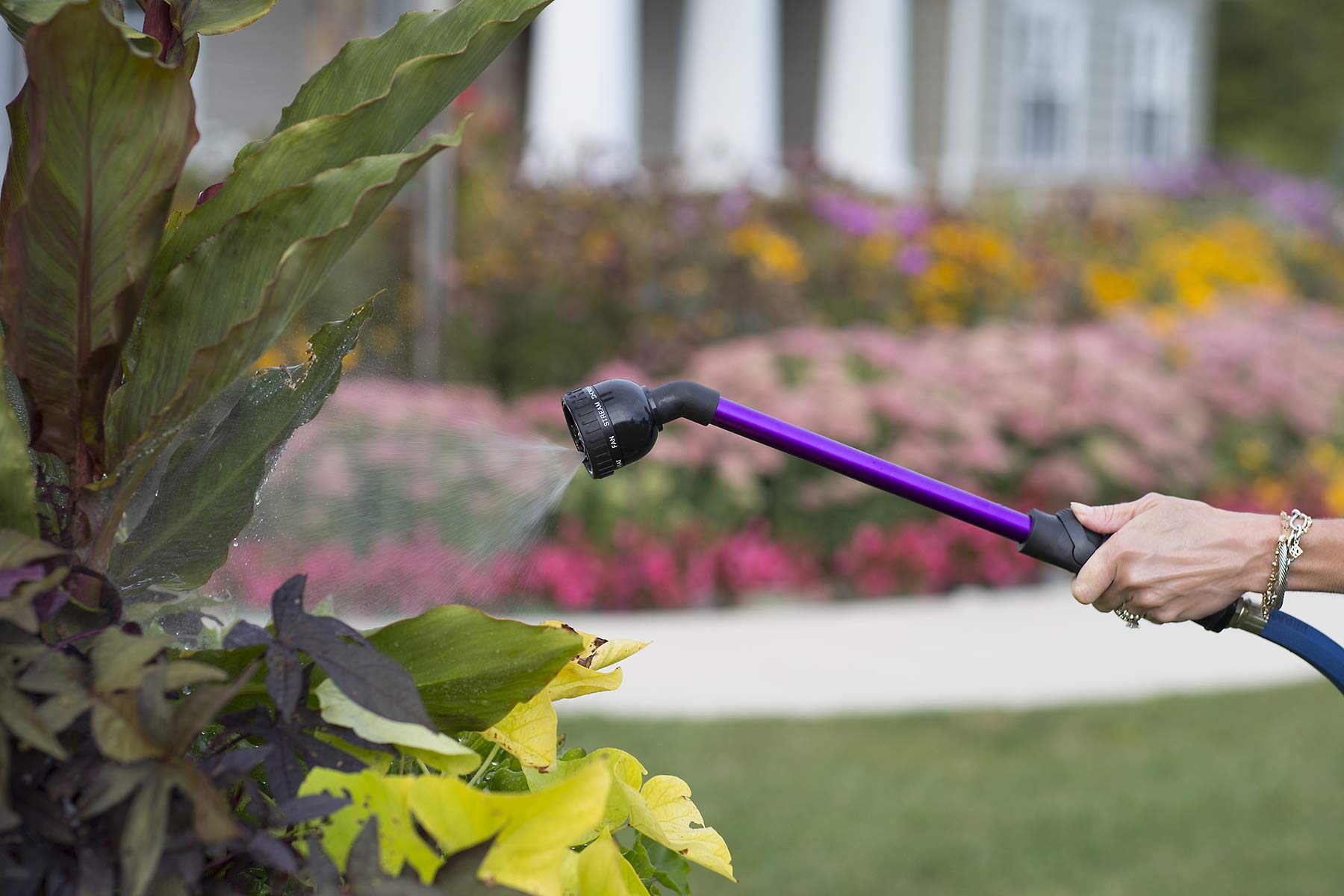 Dramm RainSelect Rain Wand in use watering flowers